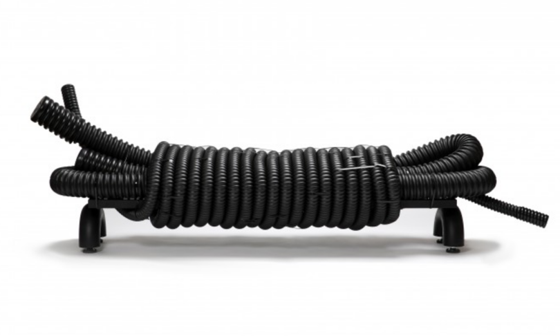 a black bench made of wrapped rope