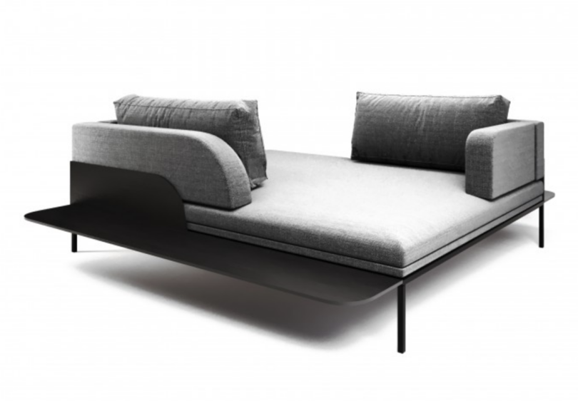 square sofa with backrests on two of the four corners