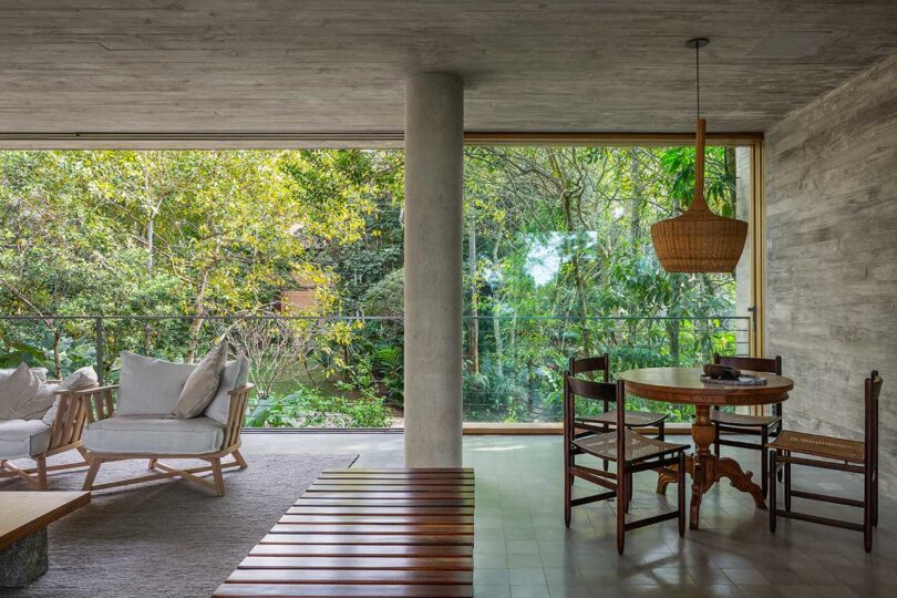 living room view with side of room opened via sliding glass doors