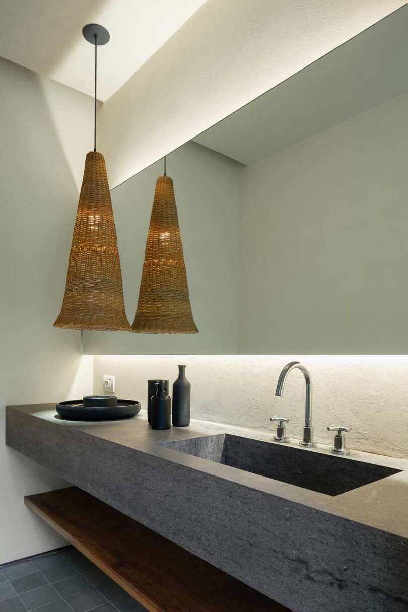 angled view of modern bathroom with hanging pendant