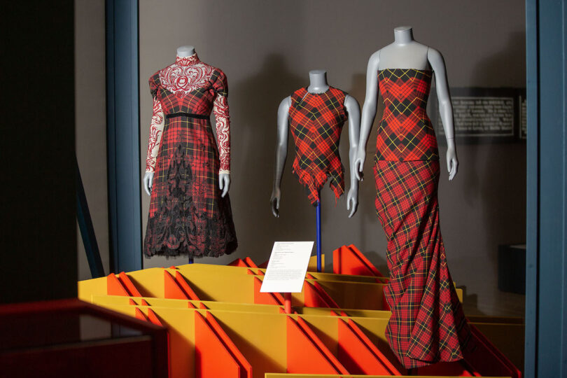 mannequins wearing tartan in museum exhibition