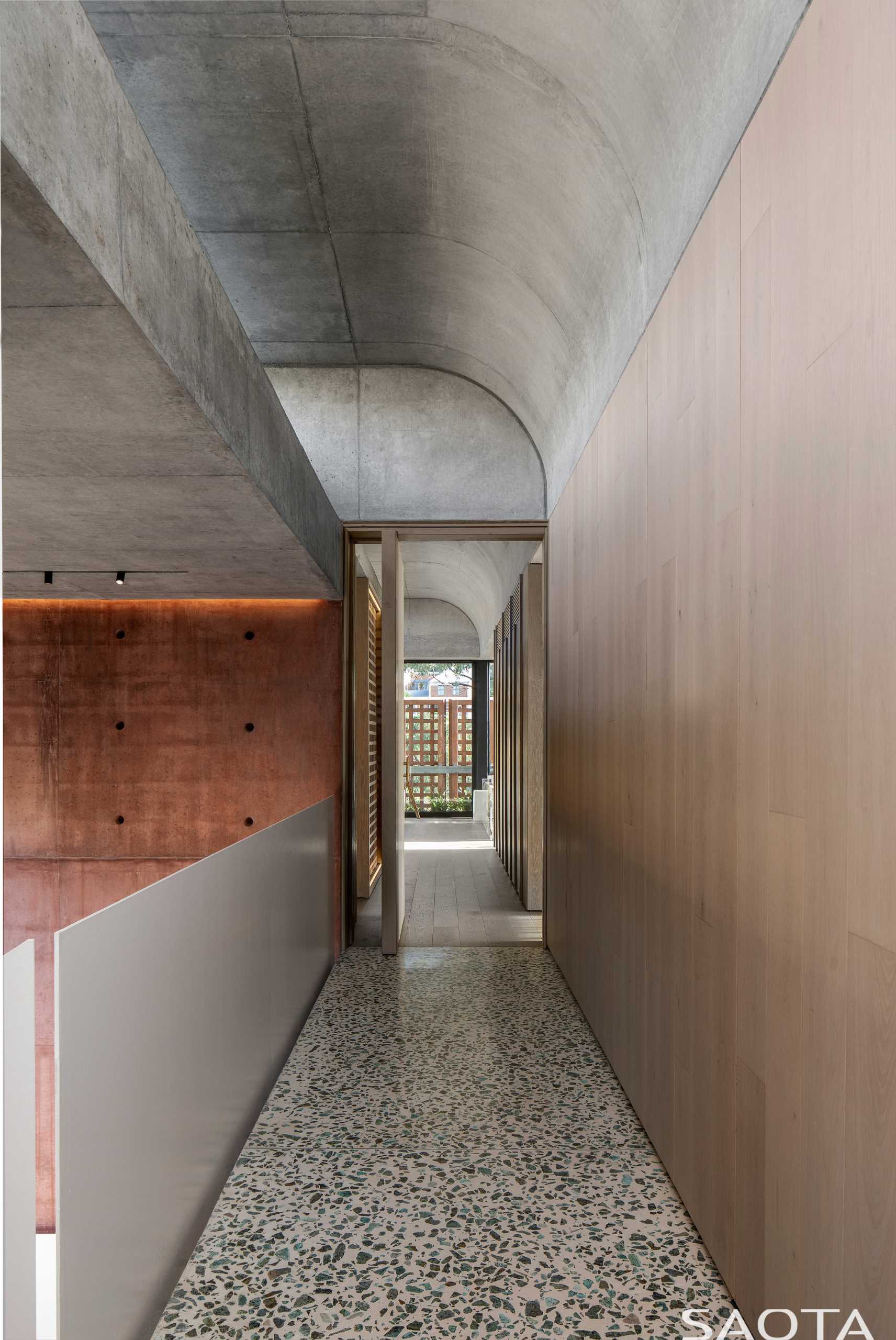A hallway with a polished polymer concrete floor.