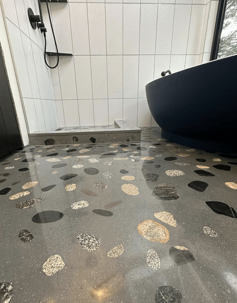 terrazzo floor in bathroom with large stone pattern