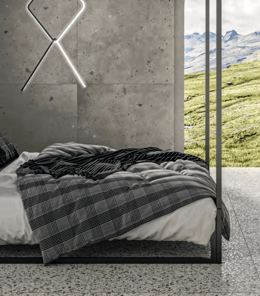 Modern concrete bedroom with terrazzo flooring