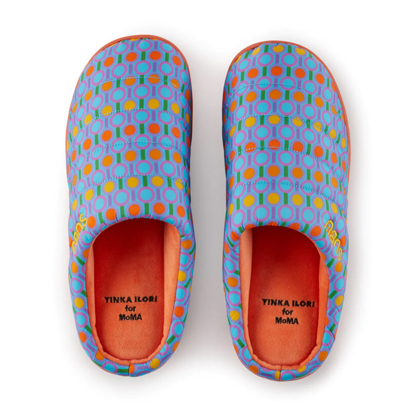 blue and orange patterned slide-on slippers on a white background