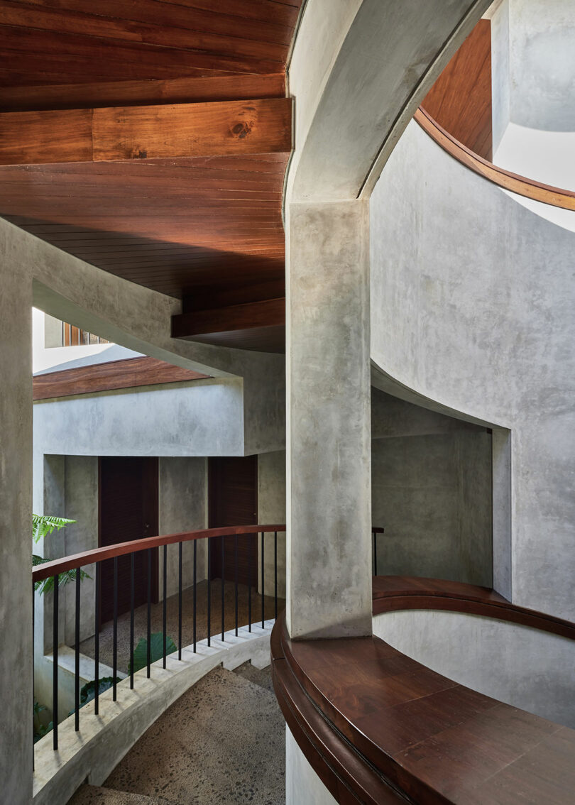 interior shot of modern house with spiral concrete and wood design