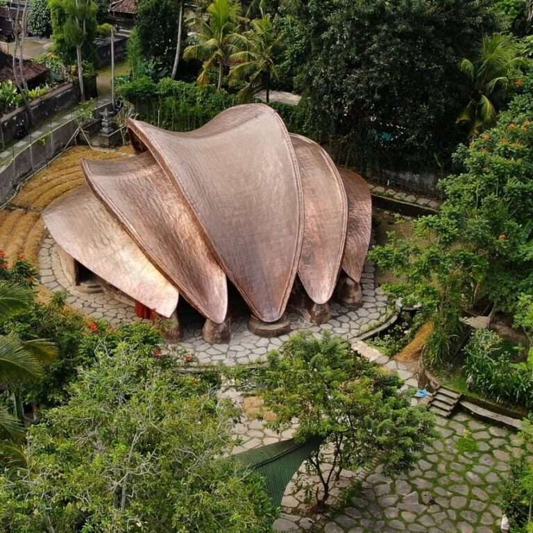 Copper-clad bamboo “petals” envelop meditation space in Bali by Ibuku