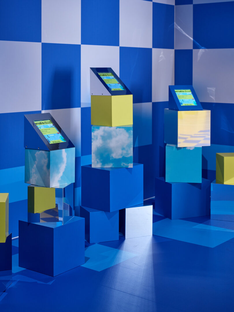 all blue section of an immersive exhibit with monitors