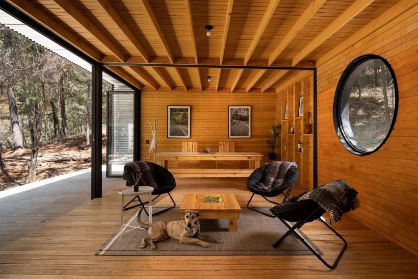 Timber interior view of cabin in the woods by S-AR