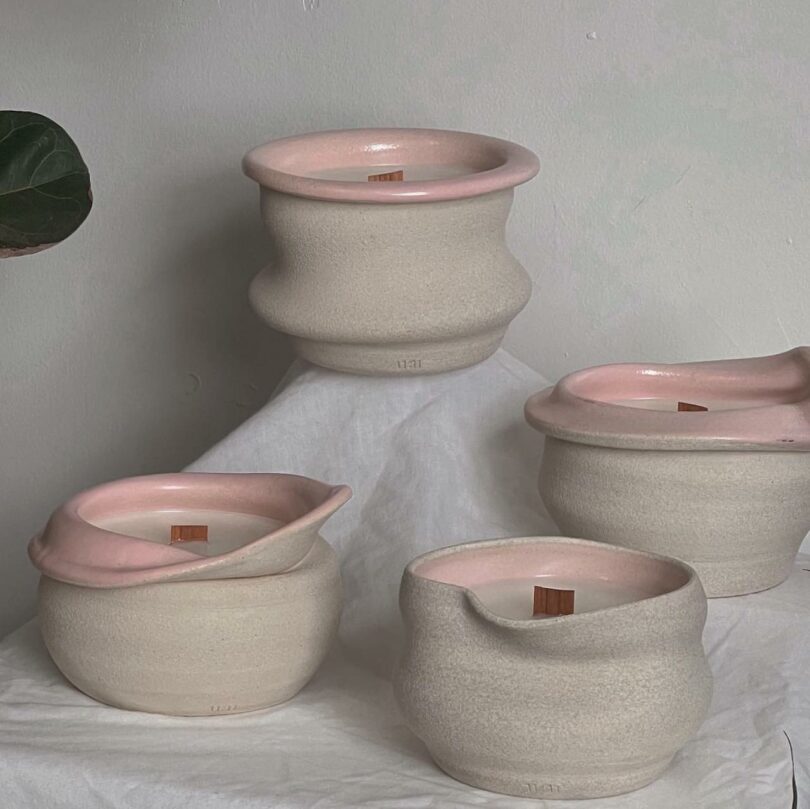 happihuman candles poured into Lulu Pots handmade ceramics