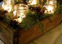 old wooden box with mason jars greenery and candles