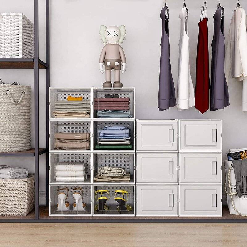 Entryway with storage and shelves beside hung up dresses.