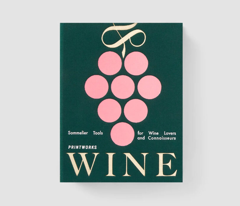dark green book cover with a light pink bunch of illustrated grapes reading WINE