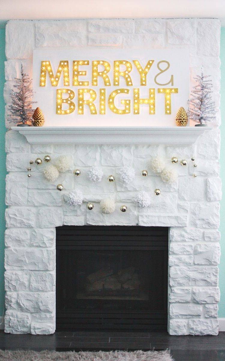 merry and bright marquee sign on white fireplace