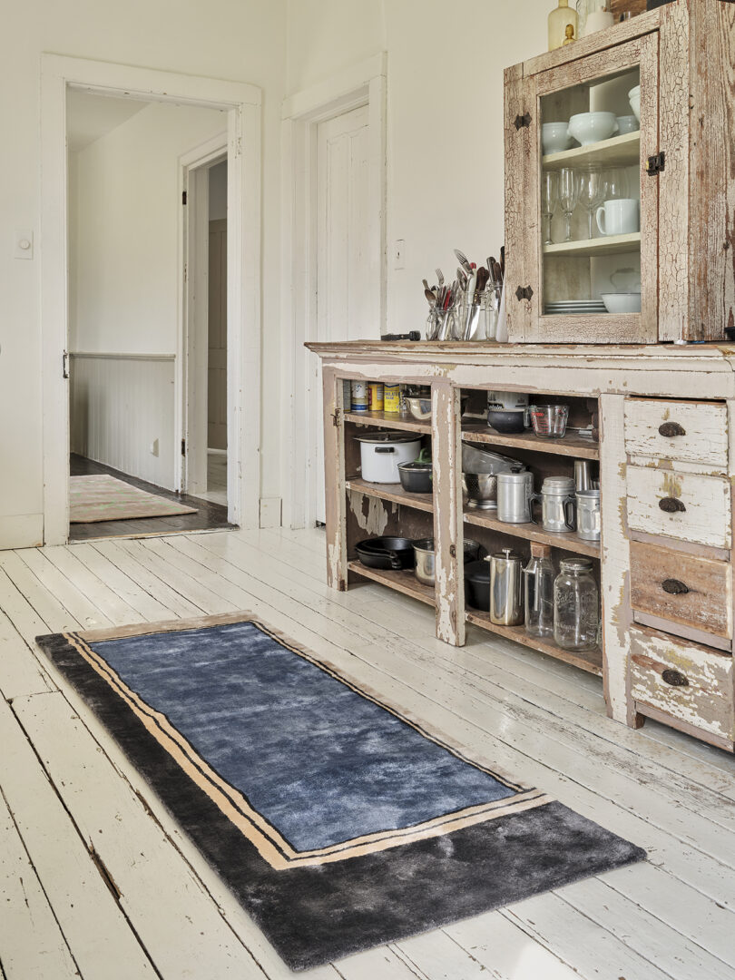 blue, cream, and black rug runner in a styled kitchen