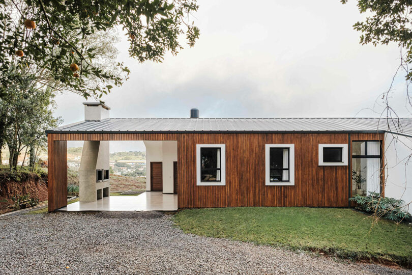 side exterior view of modern house with partial wood cladding