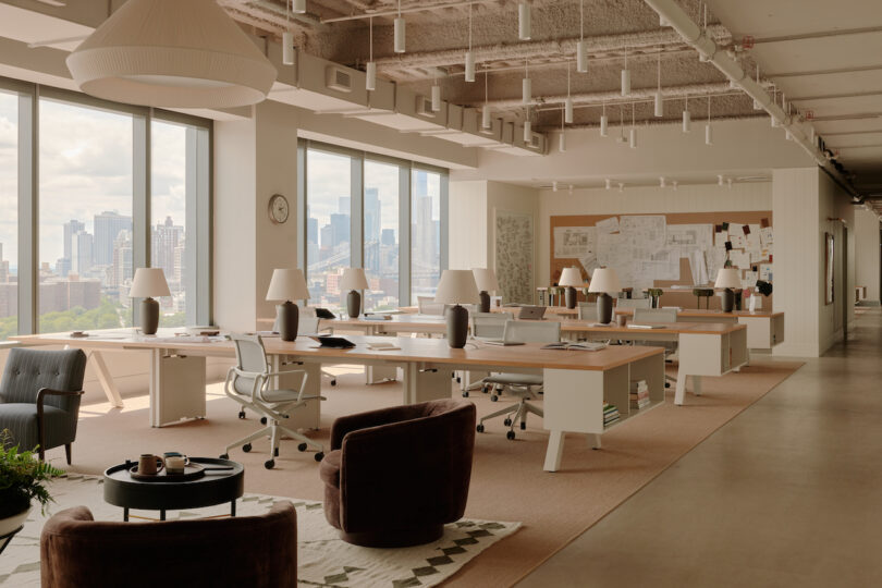 rows of work desks next to seating area