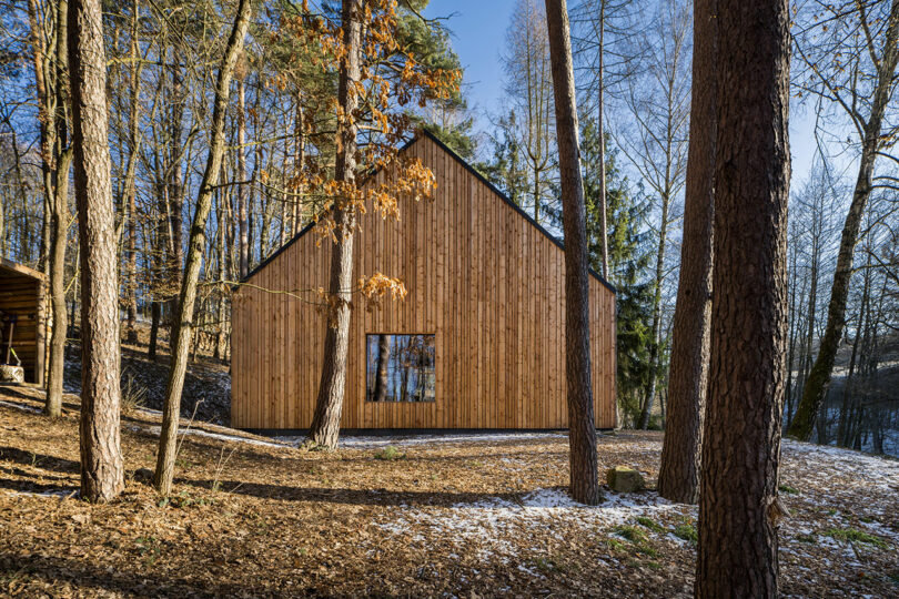 daytime shot of exterior of simple wood house