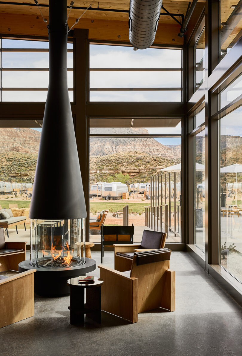 styled interior of a hospitality space with a floor to ceiling fireplace