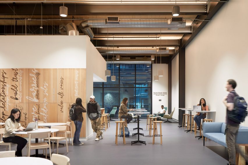 Wooden walls inscribed with words in lobby