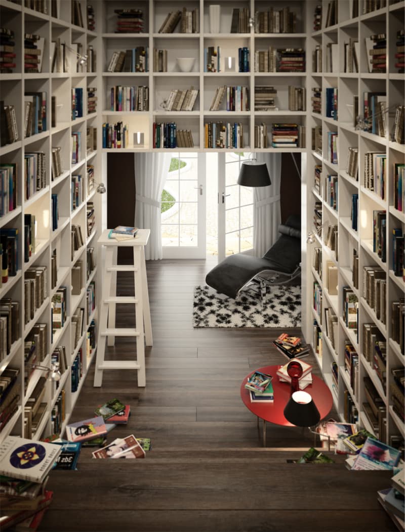 Spacious library with tall bookshelves filled with books featuring a comfortable chair in the side of the room.