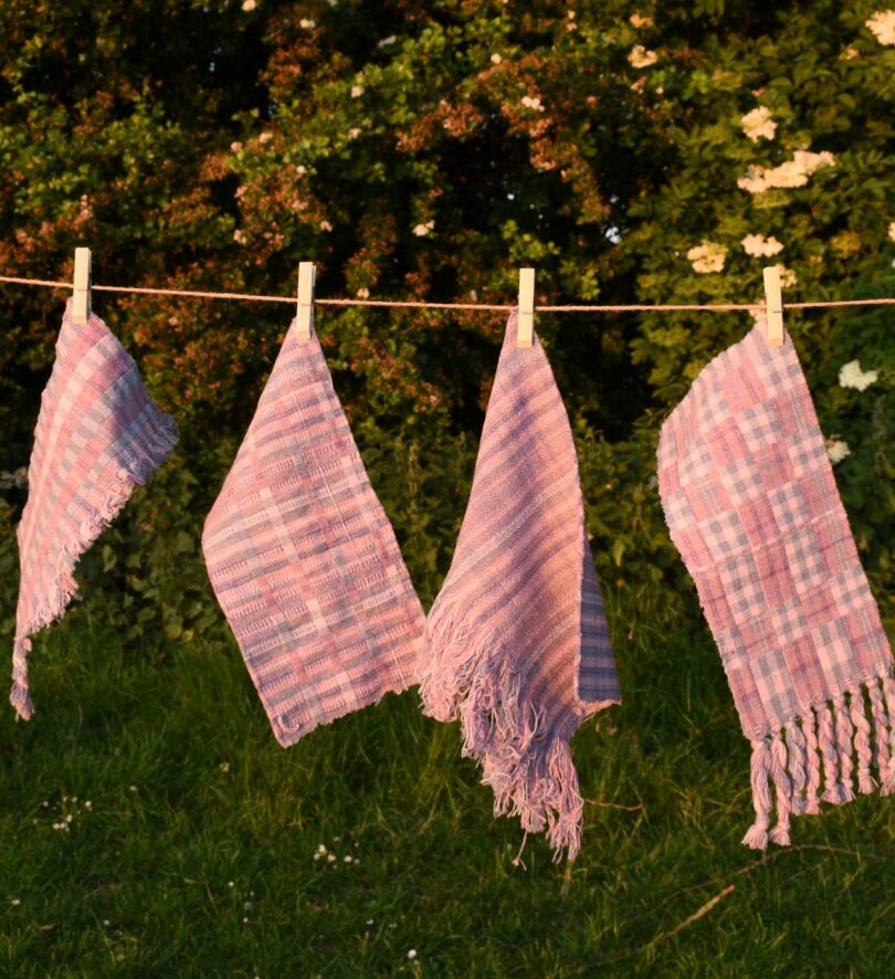 for pieces of knit textiles hanging from a clothesline