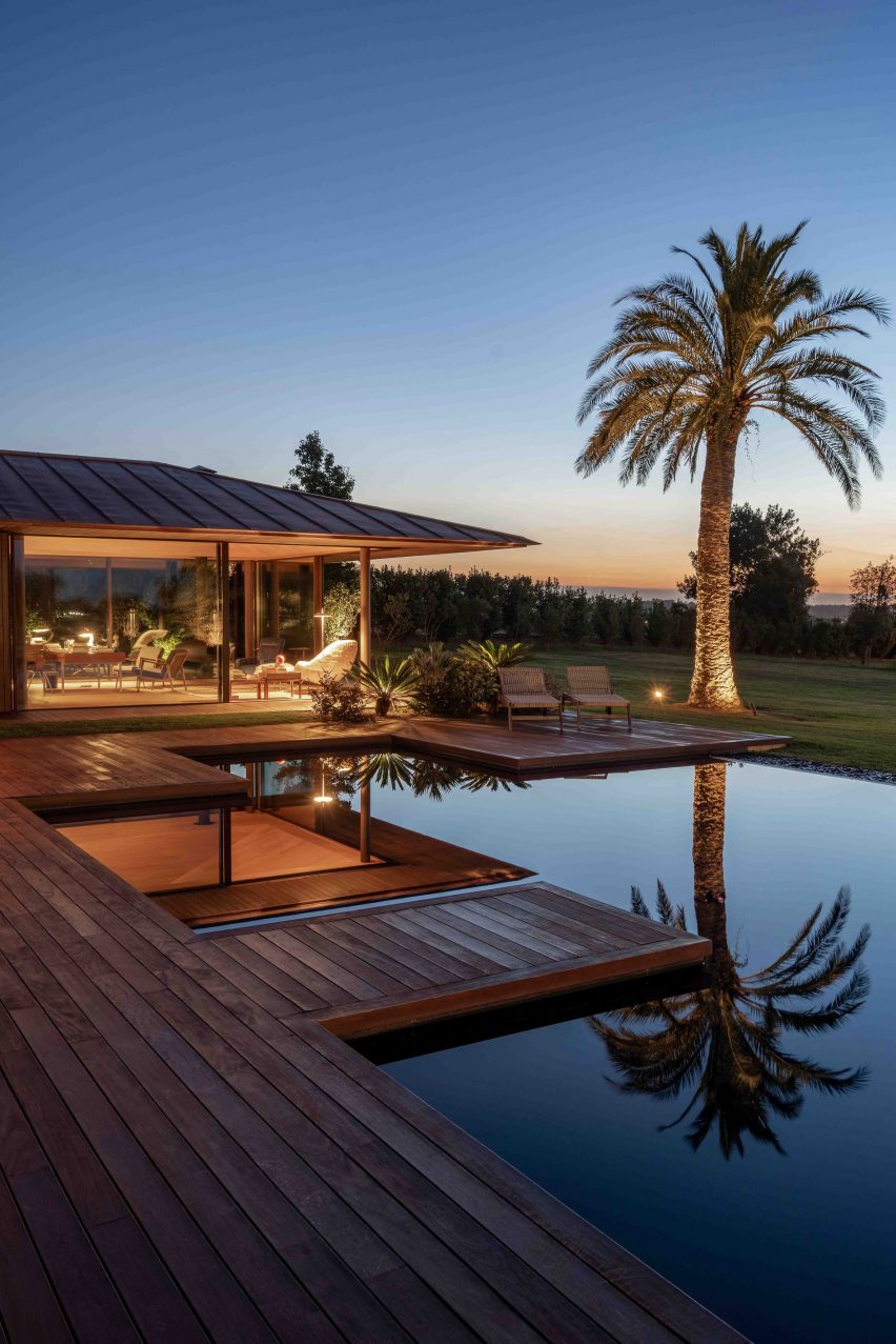 Pool and overhanging roof of the Spanish pool house 