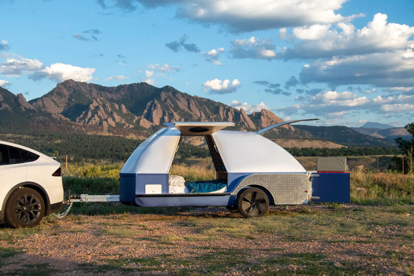 Boulder EV Teardrop Camper parked in outdoor setting towed by Tesla