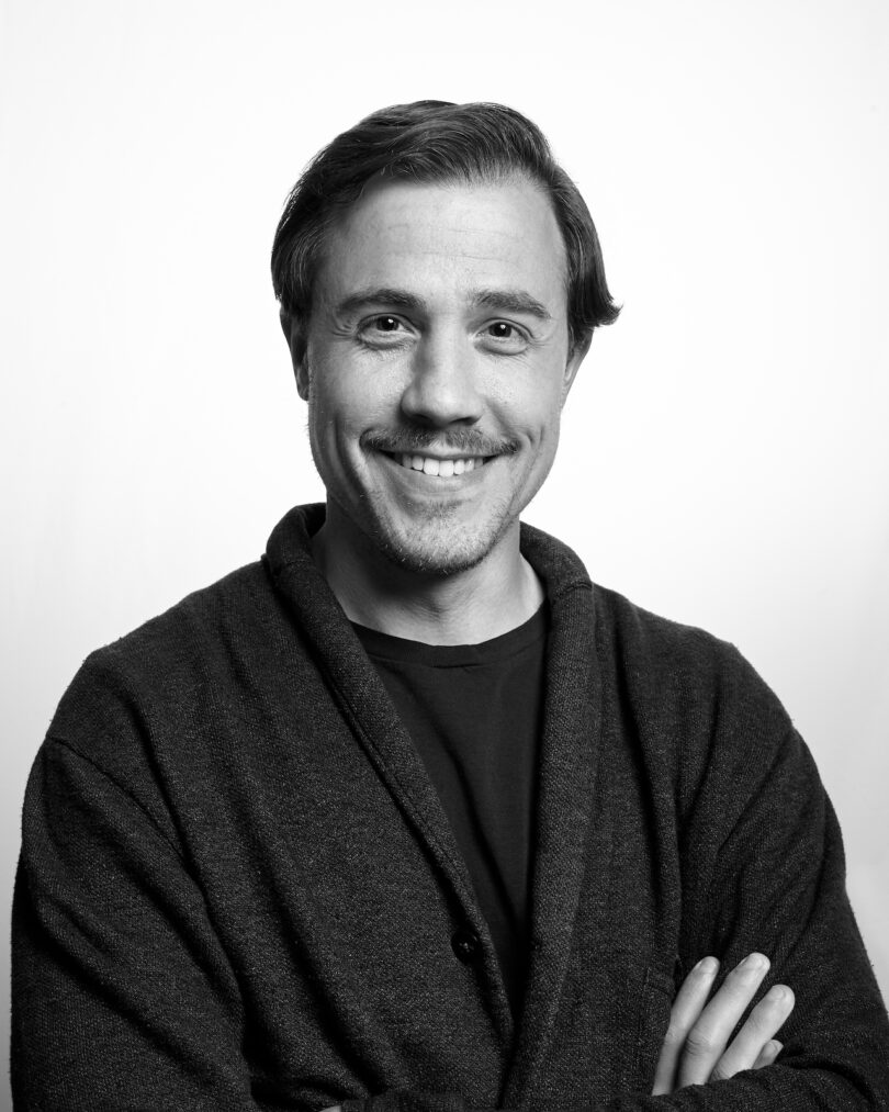 black and white photo of man's headshot