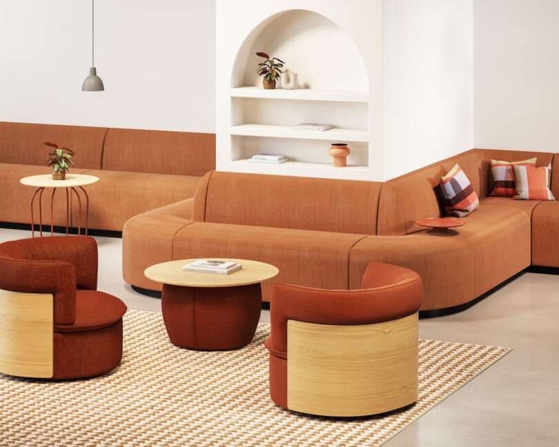 orange banquette seating around wall with built-in shelving