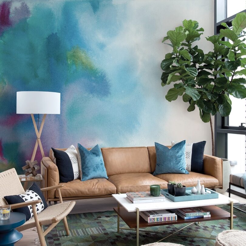 living room with watercolor mural wallpaper
