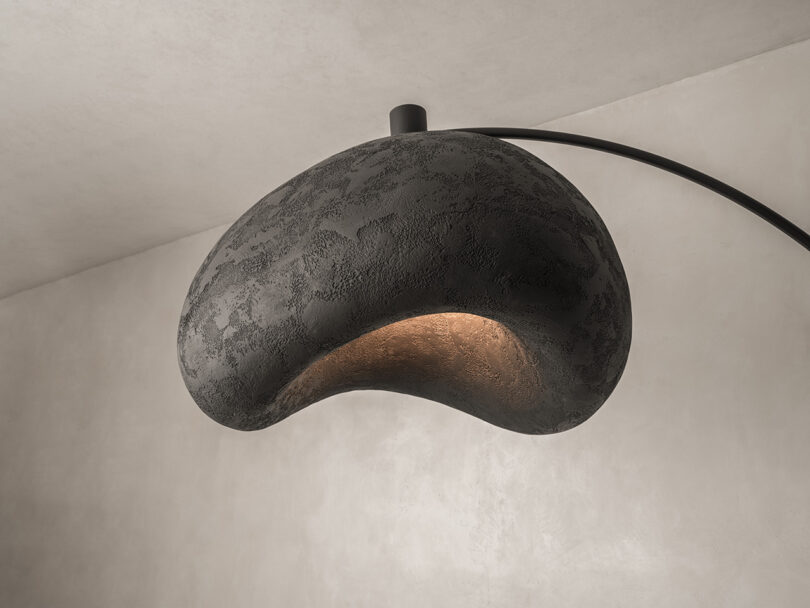 detail of modern floor lamp with large black shade