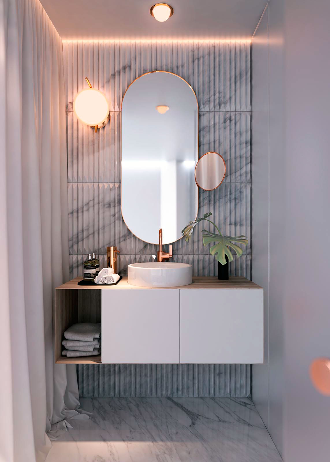 Marble bathroom with white sink and vanity accented by copper.