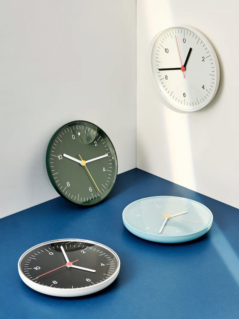 four round wall clocks