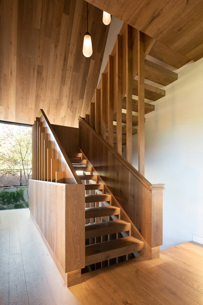 angled view of modern wood switchback staircase