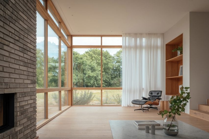 Living area in blocky white home in Sweden by Asa Hjort Architects