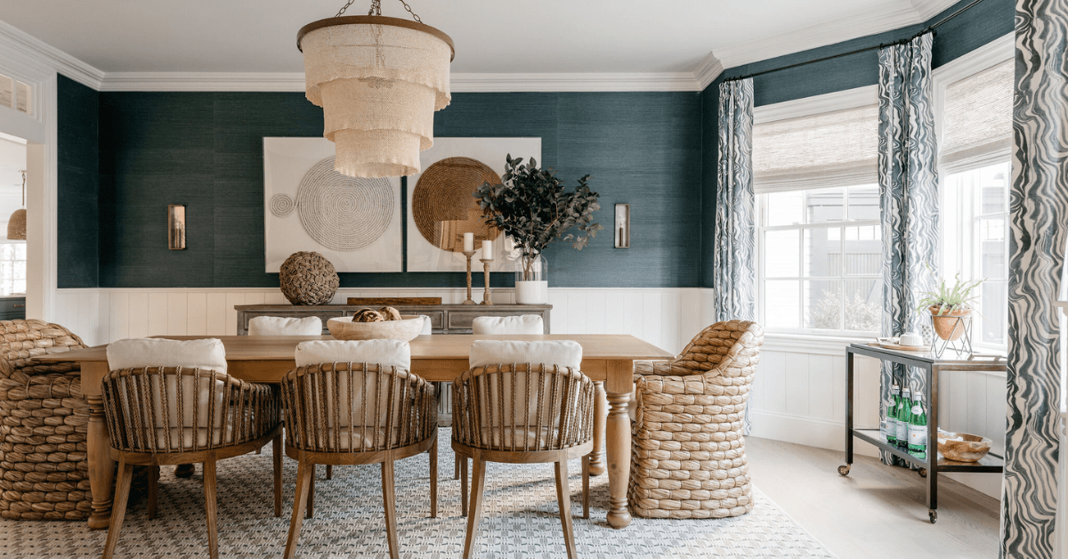 Living room with bay window curtains that are bright.