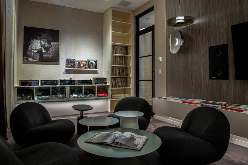 Seating and shelving for records in a listening room.