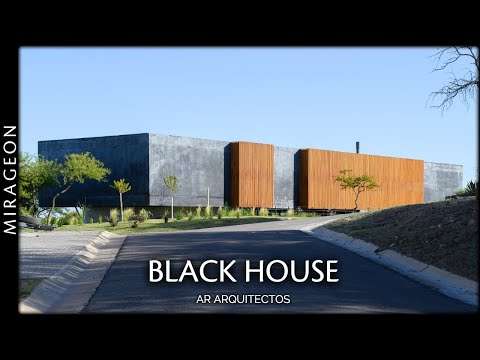 Black Concrete and Wooden Cladding Take Center Stage in the Black House