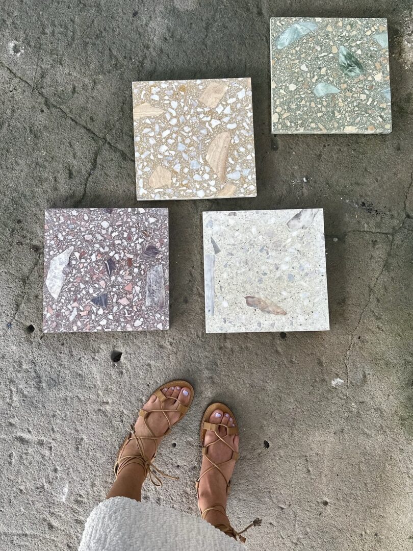 feet next to four tile samples