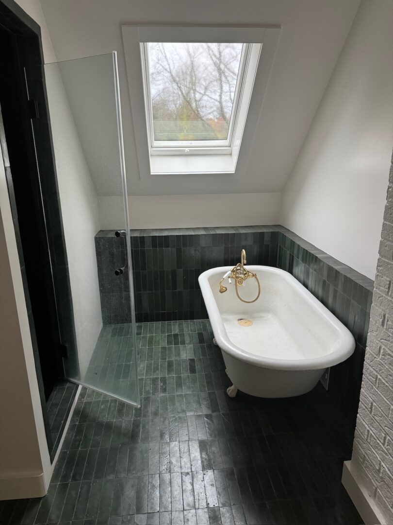 white bath tub in bathroom