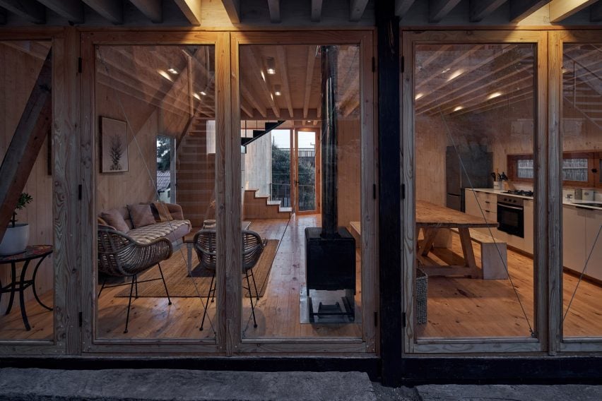 View into a home with a wood burning fireplace