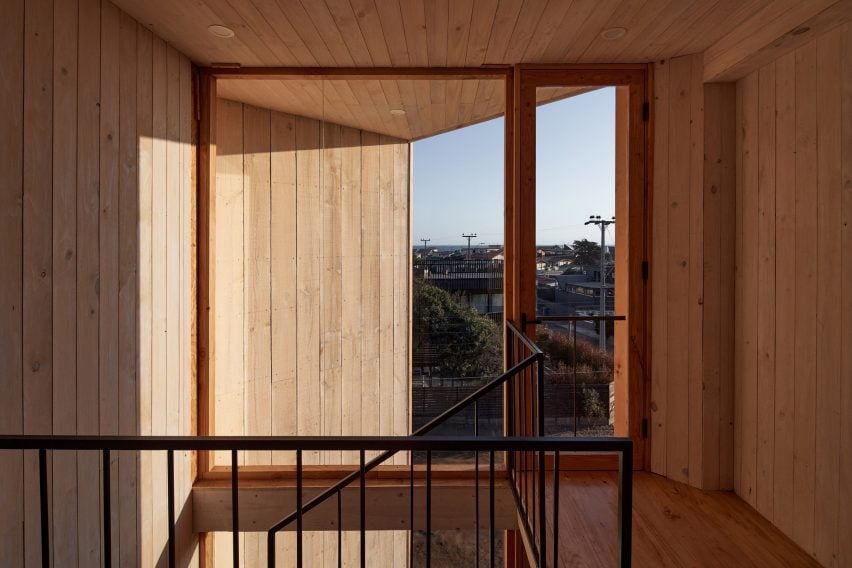 Staircase with wood paneling