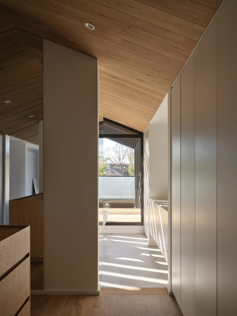 view through partially open floor in modern house that shows view from open close to bathroom