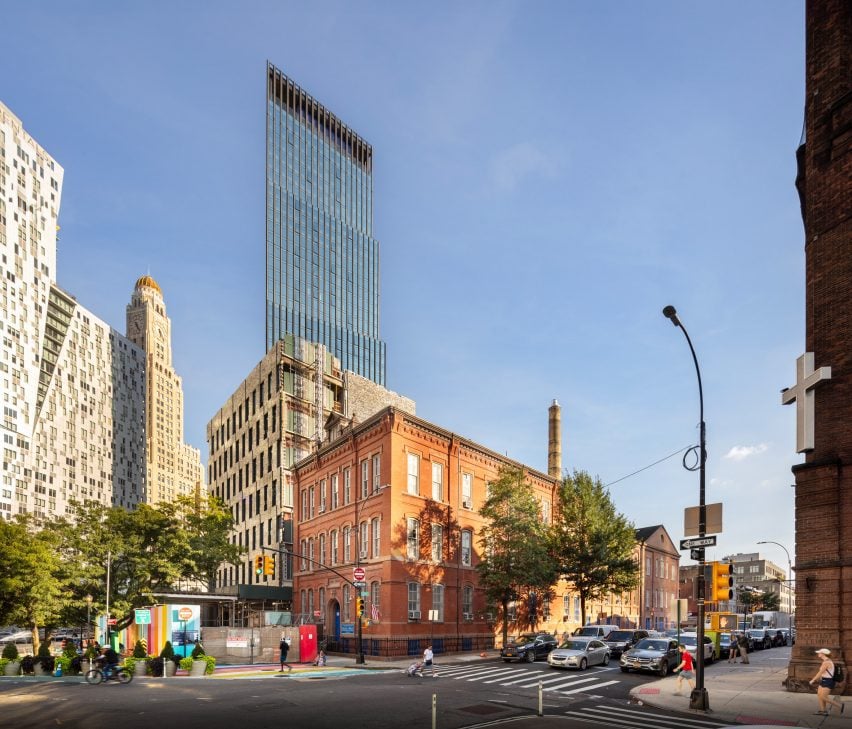 505 State Street skyscraper rising above Brooklyn brownstones