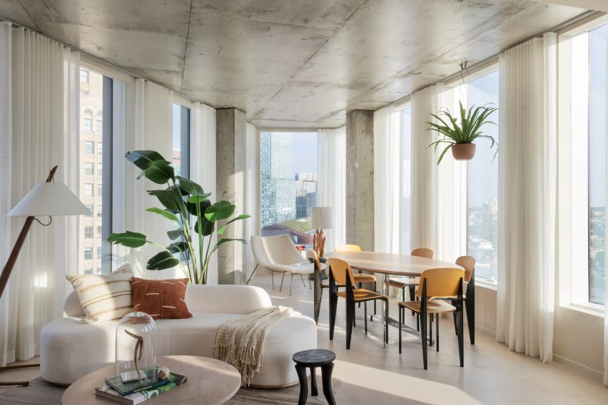 Concrete interior of triangular skyscraper apartment