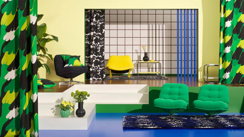 multi tiered living room setup with bold green and yellow chairs and home furnishings paired with black and blue textiles