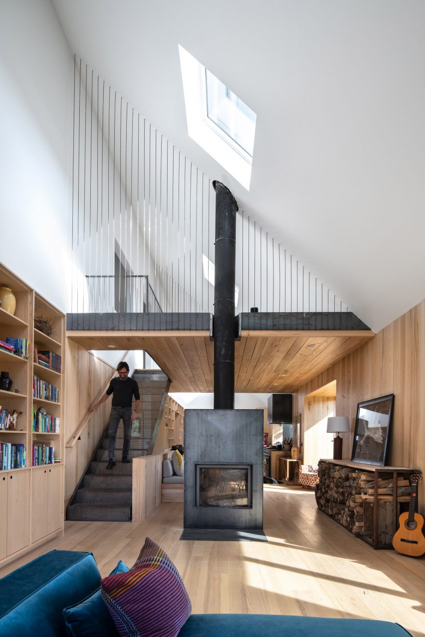 The great room and mezzanine in Berkshires Farmhouse Massachusetts by Kinneymorrow