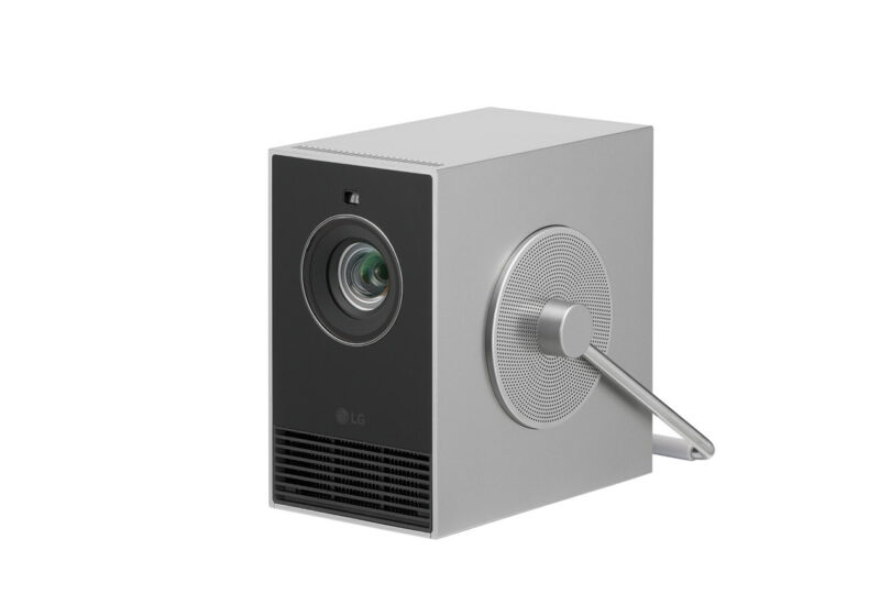 LG CineBeam Qube digital 4K projector, a minimalist aluminum sheathed box design with swiveling handle.