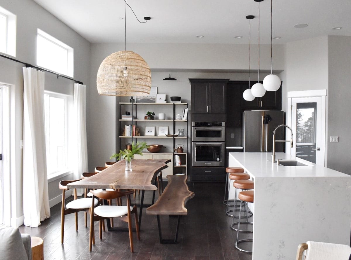 Raw wood accents in a modern organic kitchen interior by Decorilla